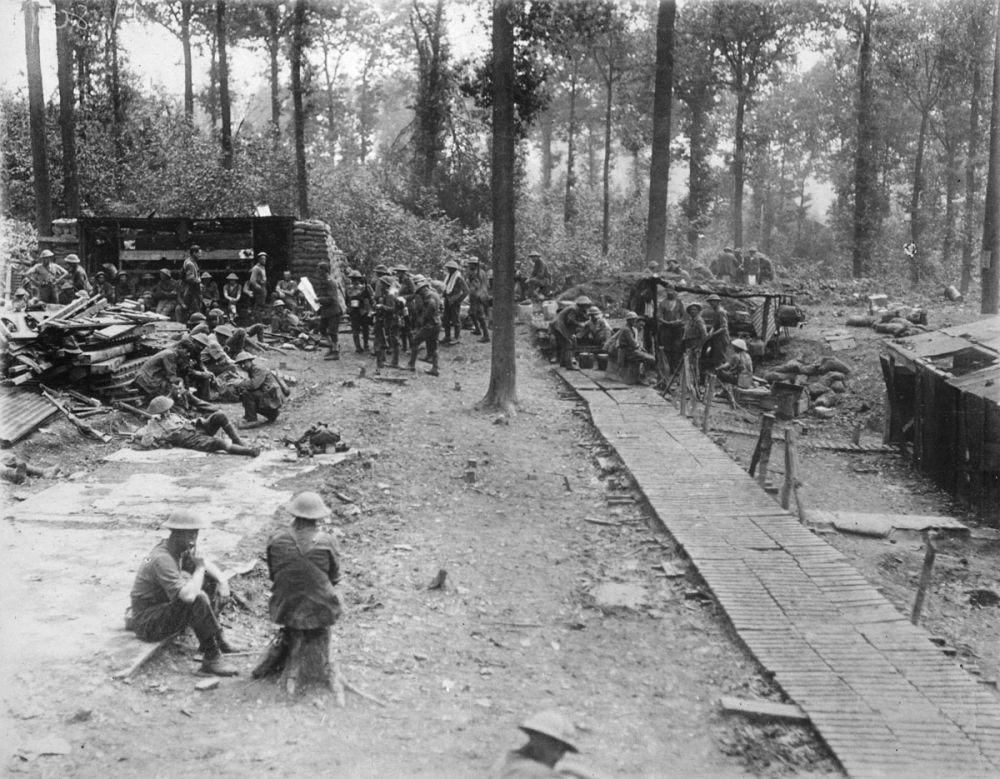 New Zealand soldiers rest at a post in Ploegsteert Wood, Belgium.